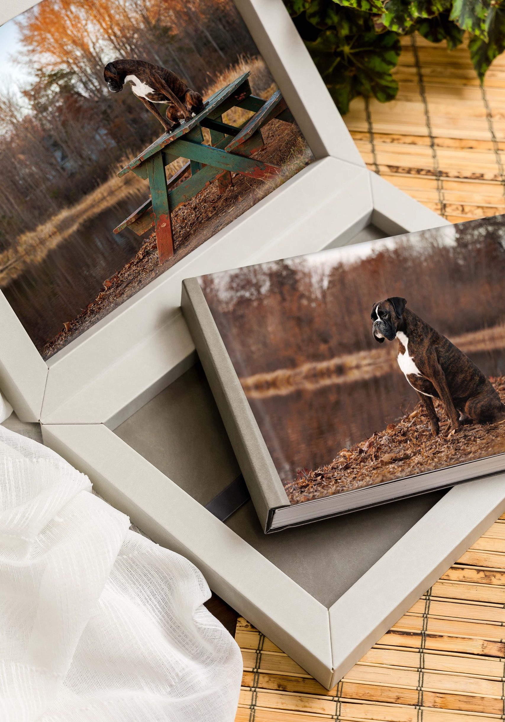 Photo album shown laying on custom storage box